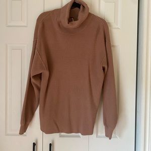 free people turtle neck tunic.